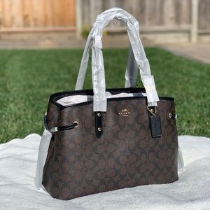 COACH DRAWSTRING CARRYALL IN SIGNATURE CANVAS